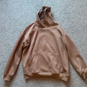 Brown plain hoodie. Soft inside. Size medium. Never worn great condition.